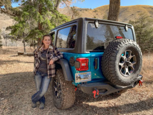 Melissa Cook standing next to her Jeep