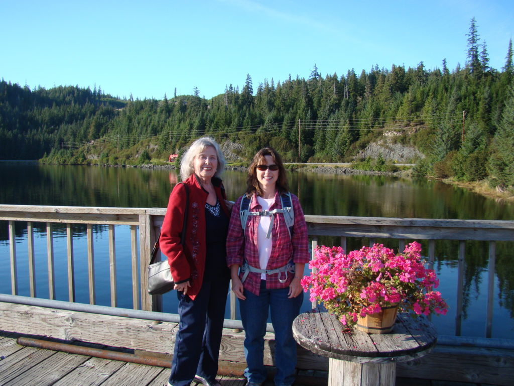 Patricia O'Flaherty and Melissa Cook stand on The Port dock in Thorne Bay, Alaska.