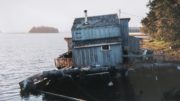 A float house resting on shore until the tide comes in to lift it again