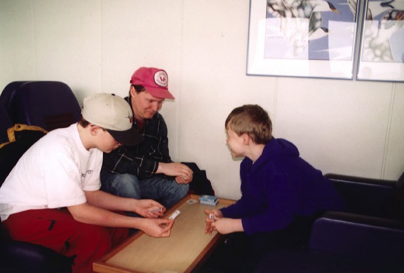 Cook family entertains themselves on a mainline ferry ride on the Malaspina