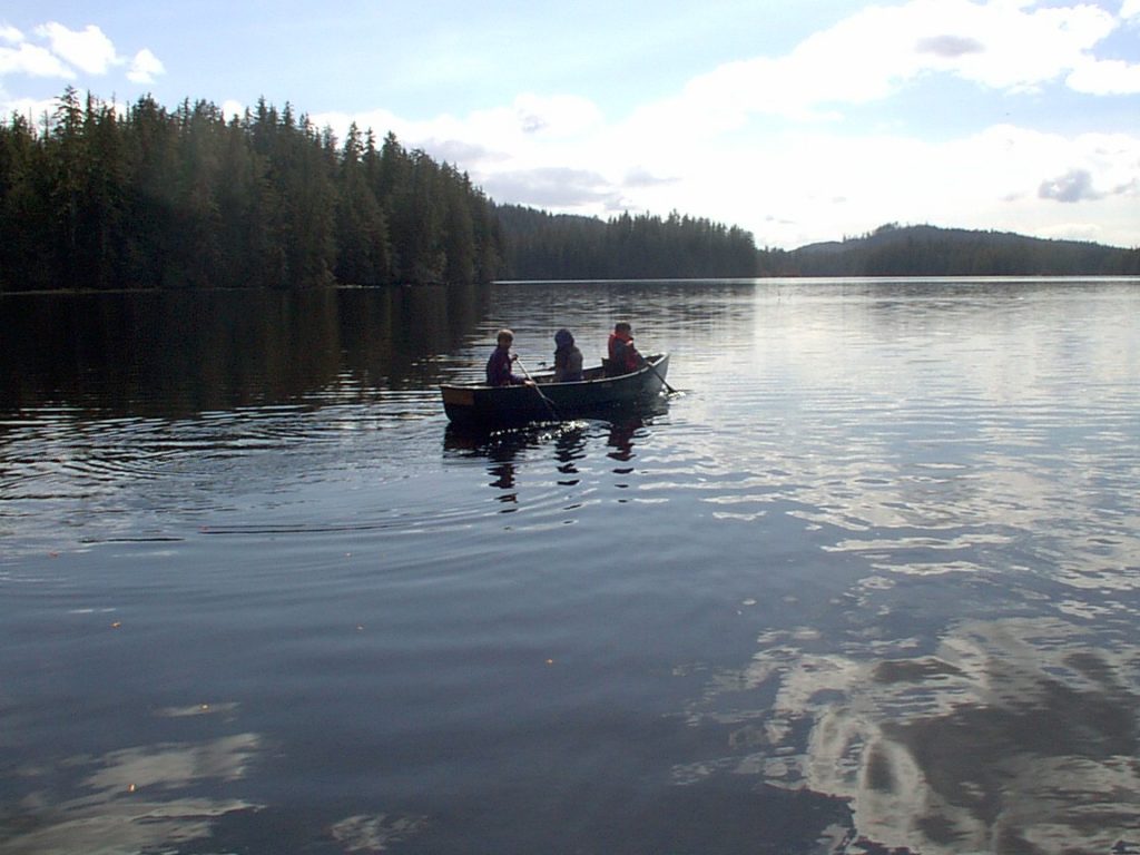 Boys canoeing on Sarkar Lake, Prince of Wales Island, Alaska