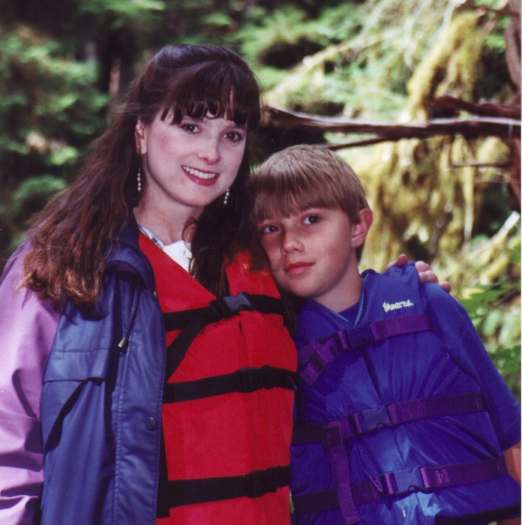 Melissa and Ethan Cook in lifevests on Sarkar Lake, Prince of Wales Island, Alaska