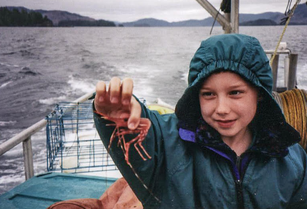Ethan Cook shows off his shrimp on a fishing boat off the coast of POW, Alaska