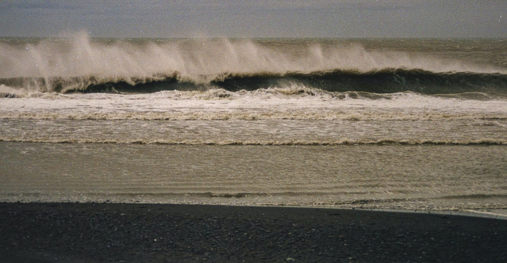 Waves rolling ashore on the Bering Sea near Nelson Lagoon, Alaska